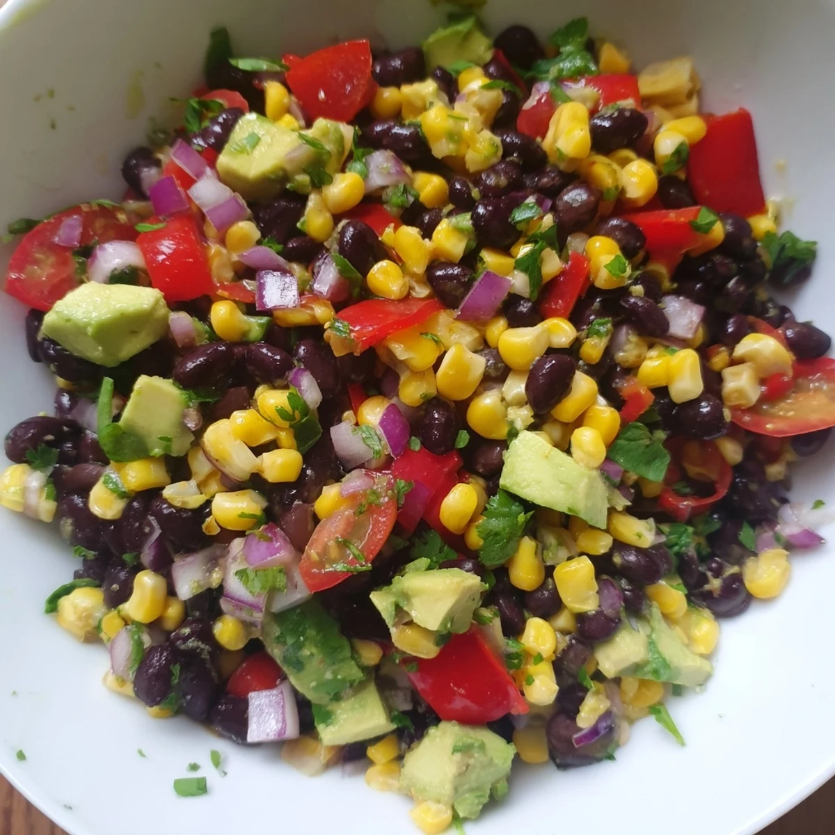 Vibrant Southwestern Black Bean and Corn Salad bursting with fresh corn, peppers, and a zesty lime dressing.