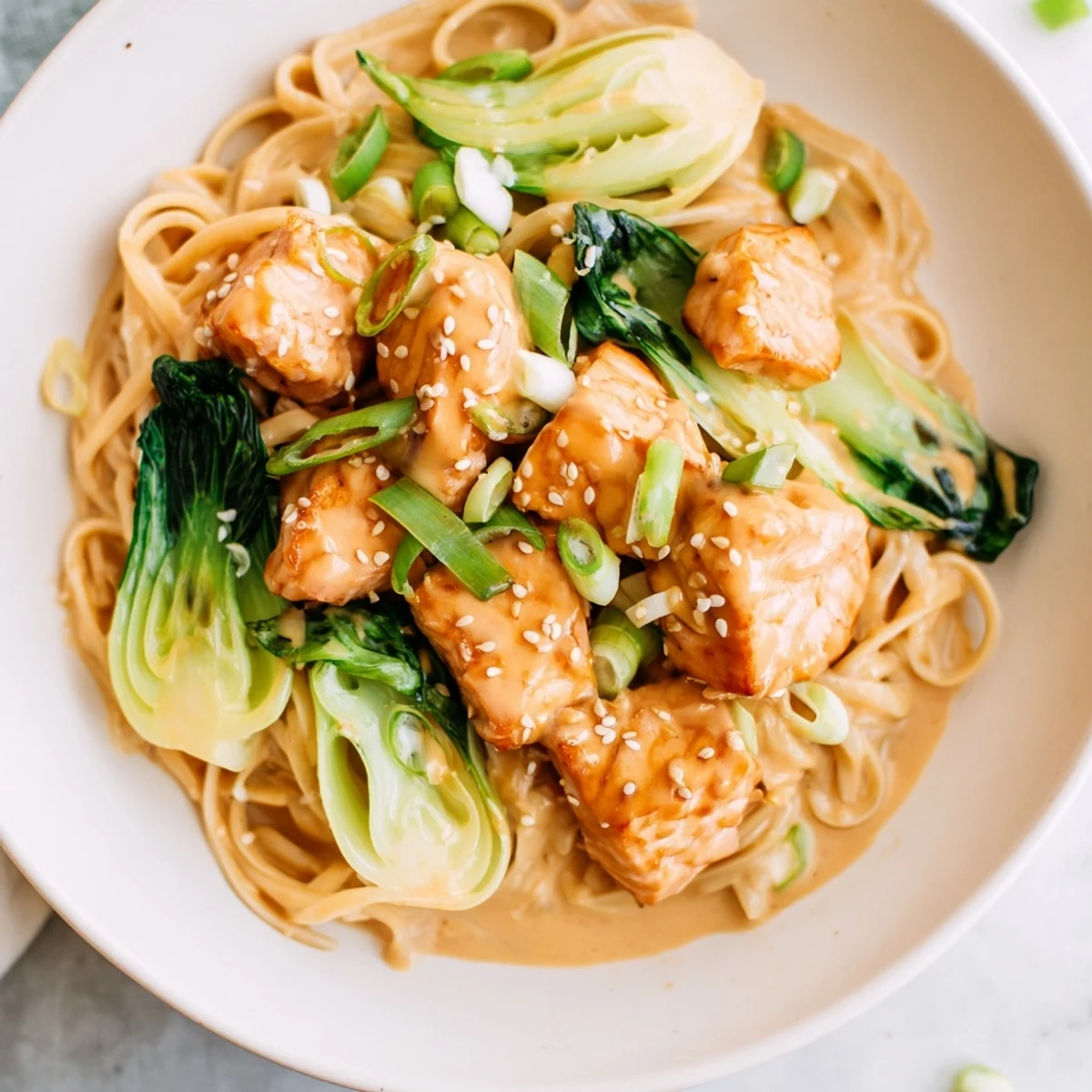 Creamy Miso Butter Salmon Pasta with perfectly cooked salmon and savory bok choy.