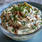Creamy chipotle lime mayonnaise with smoky peppers and zesty lime, perfect for tacos or sandwiches.