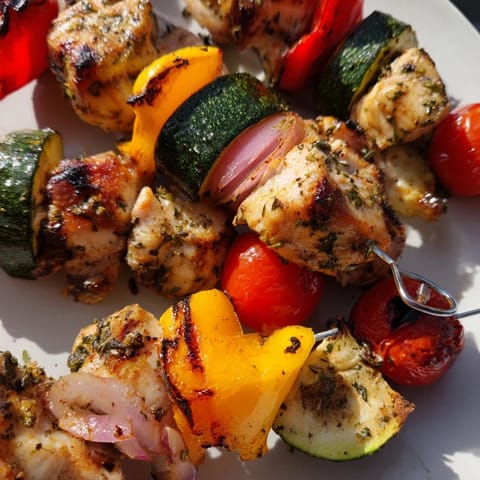 Colorful Chicken and Veggie Skewers, showing tender chicken and vibrant peppers perfect for summer grilling.