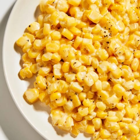 Warm, creamy honey butter skillet corn, perfect for summer barbecues or holiday meals, ready to serve.