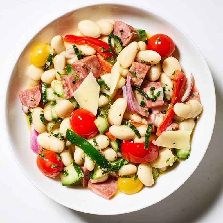 Creamy cannellini beans star in this vibrant Italian antipasto bean salad, a quick and easy appetizer.